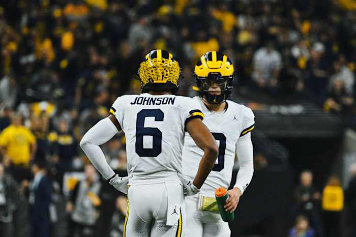 JJ McCarthy, Cornelius Johnson